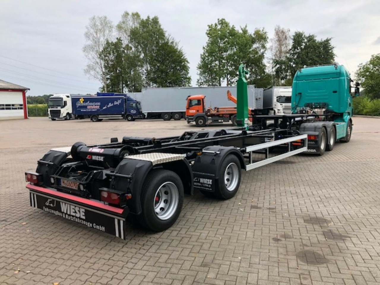 Auflieger Abrollkipper Hakenlift Hooklift - Semi-reboque transportador de contêineres/ Caixa móvel: foto 3 Auflieger Abrollkipper Hakenlift Hooklift - Semi-reboque transportador de contêineres/ Caixa móvel: foto 3