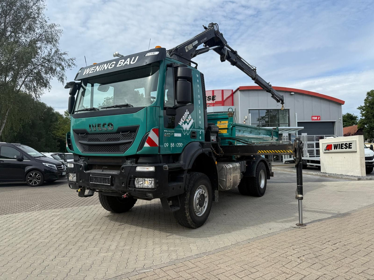 Iveco AD190 T/W Trakker 410 4x4 Allrad Kran KipperHIAB - Camião basculante, Camião grua: foto 1 Iveco AD190 T/W Trakker 410 4x4 Allrad Kran KipperHIAB - Camião basculante, Camião grua: foto 1