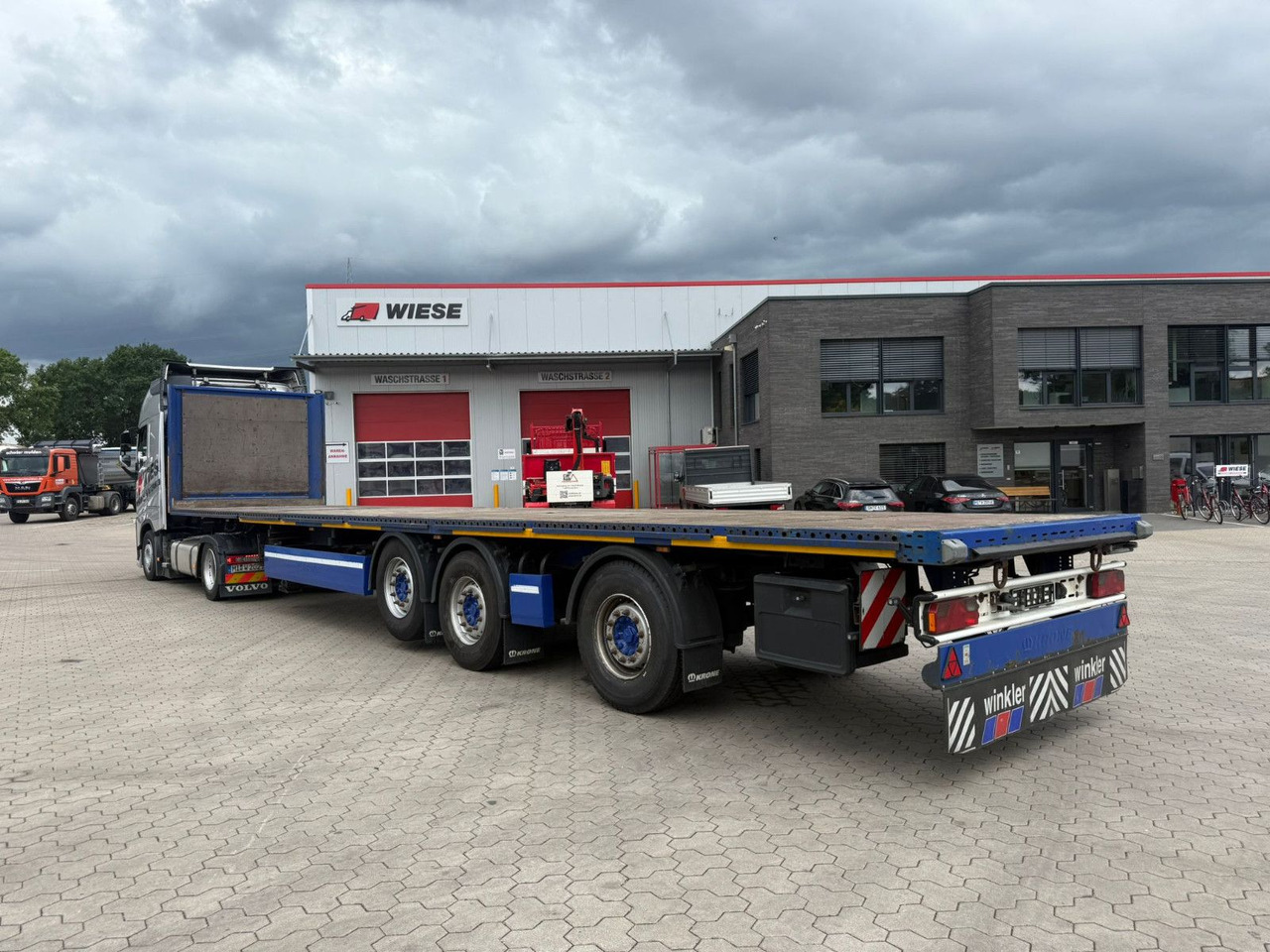 Krone Plattform Auflieger mit Tridec Zwangslenkung - Semi-reboque plataforma/ Caixa aberta: foto 1 Krone Plattform Auflieger mit Tridec Zwangslenkung - Semi-reboque plataforma/ Caixa aberta: foto 1