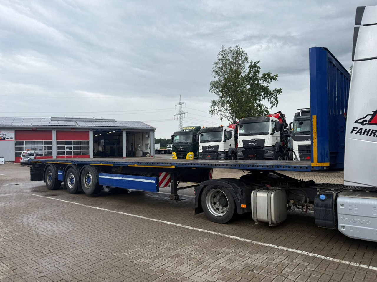Krone Plattform Auflieger mit Tridec Zwangslenkung - Semi-reboque plataforma/ Caixa aberta: foto 3 Krone Plattform Auflieger mit Tridec Zwangslenkung - Semi-reboque plataforma/ Caixa aberta: foto 3