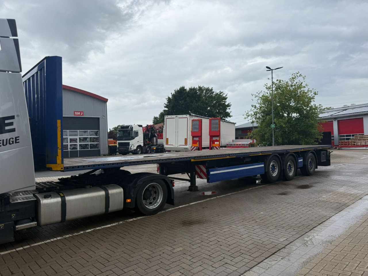 Krone Plattform Auflieger mit Tridec Zwangslenkung - Semi-reboque plataforma/ Caixa aberta: foto 4 Krone Plattform Auflieger mit Tridec Zwangslenkung - Semi-reboque plataforma/ Caixa aberta: foto 4