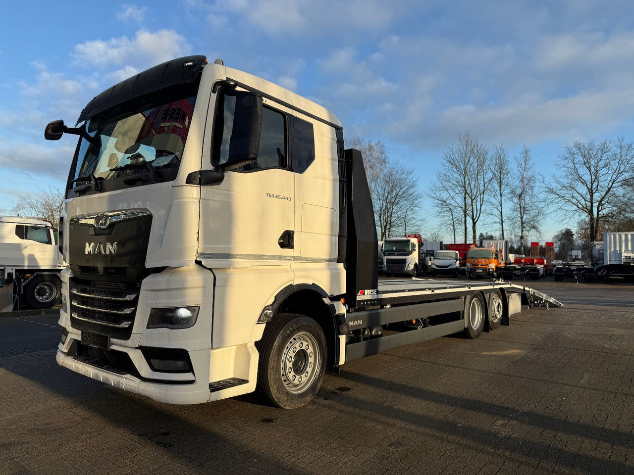 MAN Baumaschinen- Arbeitsbühnentransporter Rampen - Camião de caixa aberta/ Plataforma: foto 4 MAN Baumaschinen- Arbeitsbühnentransporter Rampen - Camião de caixa aberta/ Plataforma: foto 4