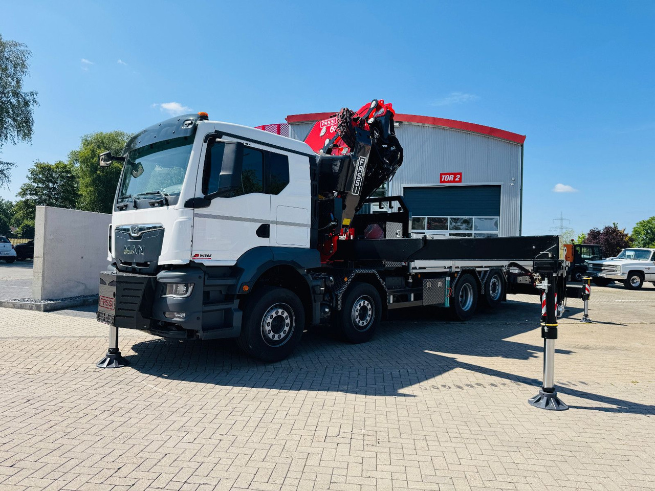 MAN TGS 32.510 mit F710 Frontkran sofort - Camião de caixa aberta/ Plataforma, Camião grua: foto 2 MAN TGS 32.510 mit F710 Frontkran sofort - Camião de caixa aberta/ Plataforma, Camião grua: foto 2