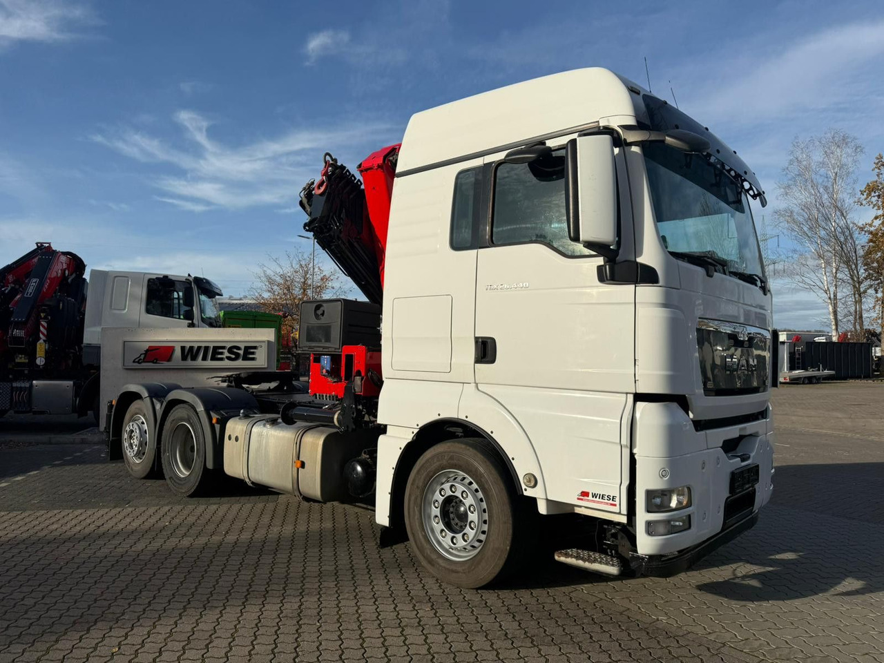 MAN TGX 26.440 6x2 mit HMF 3000-5 Kran Top Zustand - Camião grua: foto 3 MAN TGX 26.440 6x2 mit HMF 3000-5 Kran Top Zustand - Camião grua: foto 3