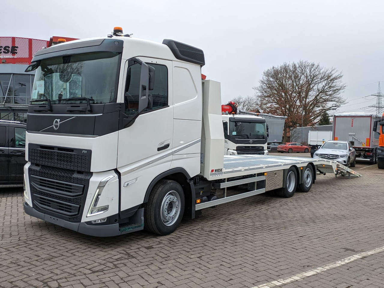 Volvo FH 420 Maschinentransporter mit Rampen - Camião de caixa aberta/ Plataforma: foto 1 Volvo FH 420 Maschinentransporter mit Rampen - Camião de caixa aberta/ Plataforma: foto 1