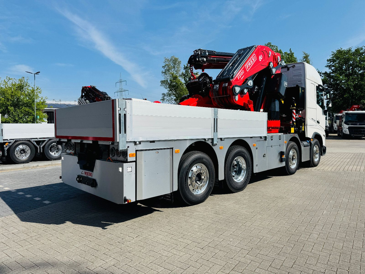 Volvo FH 540 mit Fassi F2150RAL Fly Jib + Winde - Camião de caixa aberta/ Plataforma, Camião grua: foto 2 Volvo FH 540 mit Fassi F2150RAL Fly Jib + Winde - Camião de caixa aberta/ Plataforma, Camião grua: foto 2
