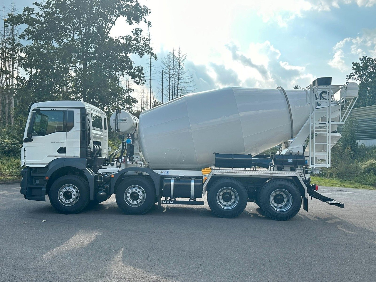 MAN TGS 32.440 8x4 / Euromix MTP EM 9 L - Camião betoneira: foto 4 MAN TGS 32.440 8x4 / Euromix MTP EM 9 L - Camião betoneira: foto 4