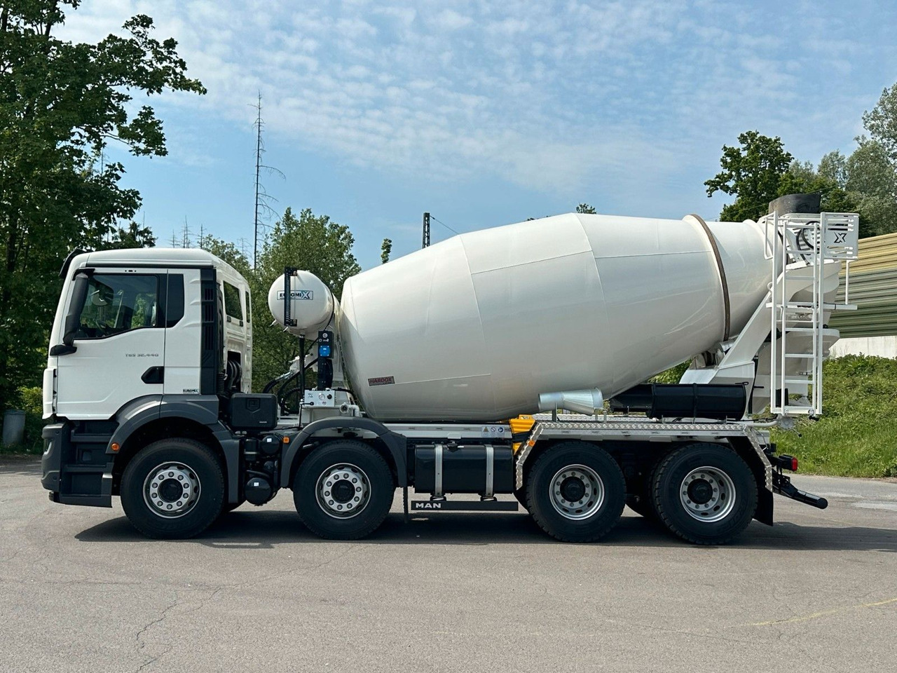 MAN TGS 32.440 8x4 / Euromix MTP EM 9 L - Camião betoneira: foto 4 MAN TGS 32.440 8x4 / Euromix MTP EM 9 L - Camião betoneira: foto 4