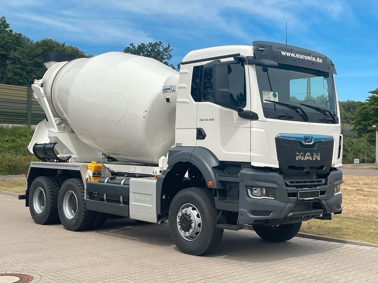 MAN TGS 33.440 / 6X6 Euro6e Euromix MTP EM 7 L - Camião betoneira: foto 1 MAN TGS 33.440 / 6X6 Euro6e Euromix MTP EM 7 L - Camião betoneira: foto 1