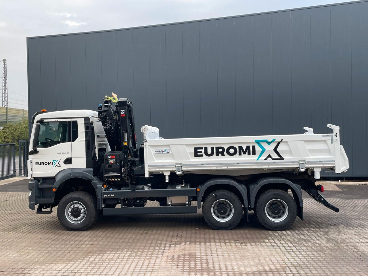 MAN TGS 33.440 6x6 /3-Seiten- Kipper / HIAB 228-6 - Camião basculante, Camião grua: foto 2 MAN TGS 33.440 6x6 /3-Seiten- Kipper / HIAB 228-6 - Camião basculante, Camião grua: foto 2