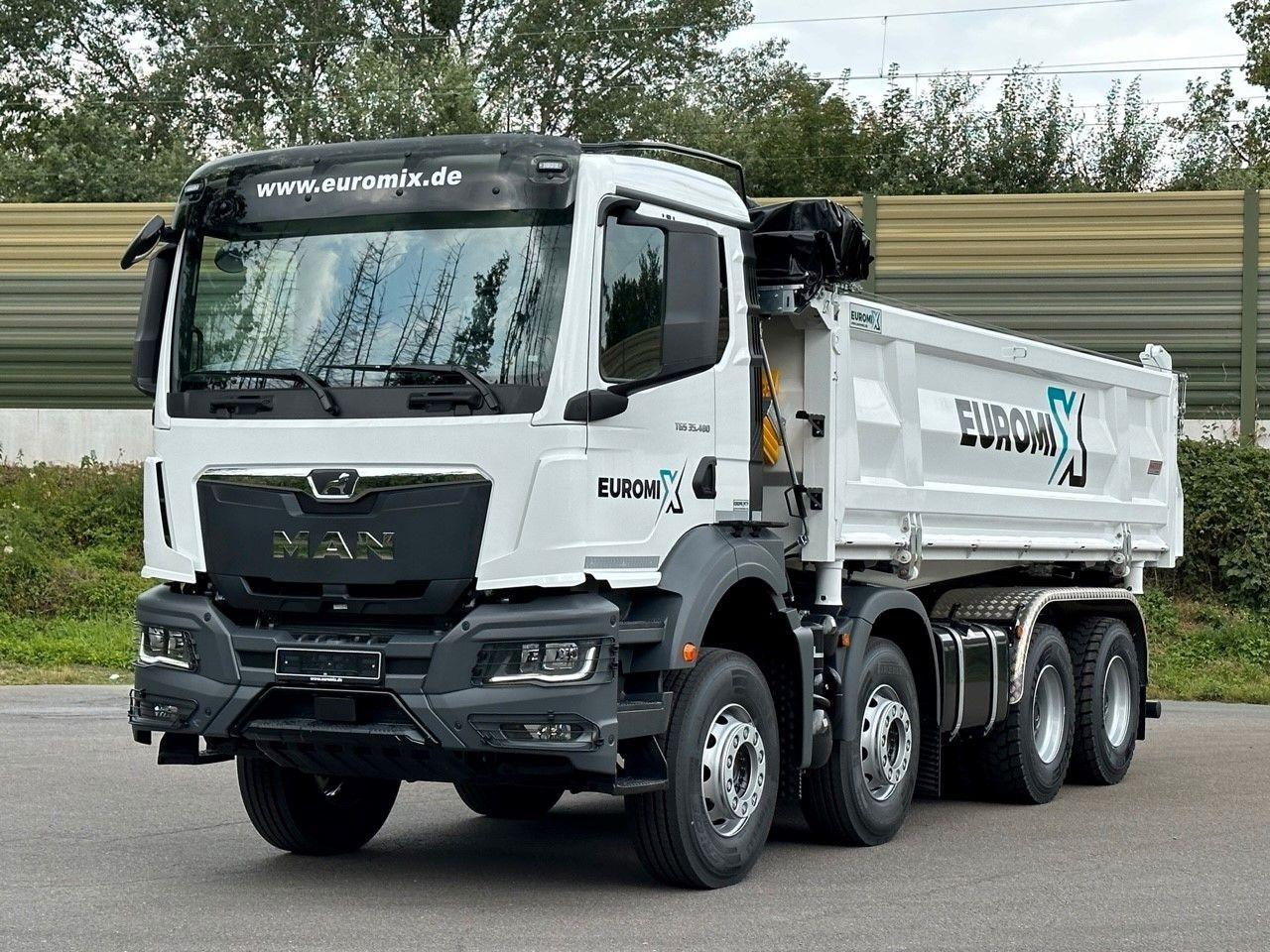 MAN TGS 35.480 8x4 EuromixMTP 3-Seiten-Kipper - Camião basculante: foto 2 MAN TGS 35.480 8x4 EuromixMTP 3-Seiten-Kipper - Camião basculante: foto 2