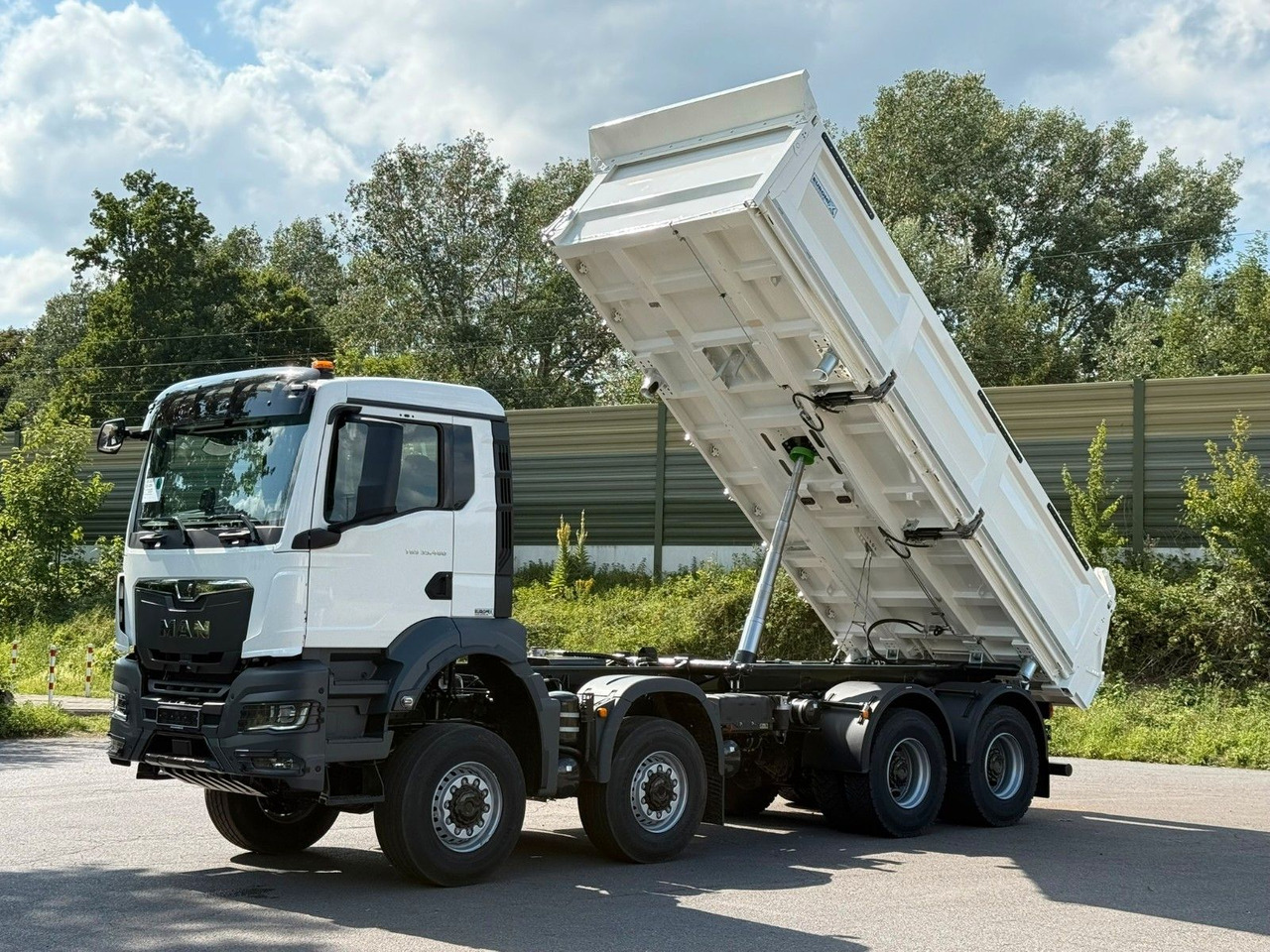 MAN TGS 35.480 8x8 EuromixMTP 3-Seiten-Kipper - Camião basculante: foto 1 MAN TGS 35.480 8x8 EuromixMTP 3-Seiten-Kipper - Camião basculante: foto 1