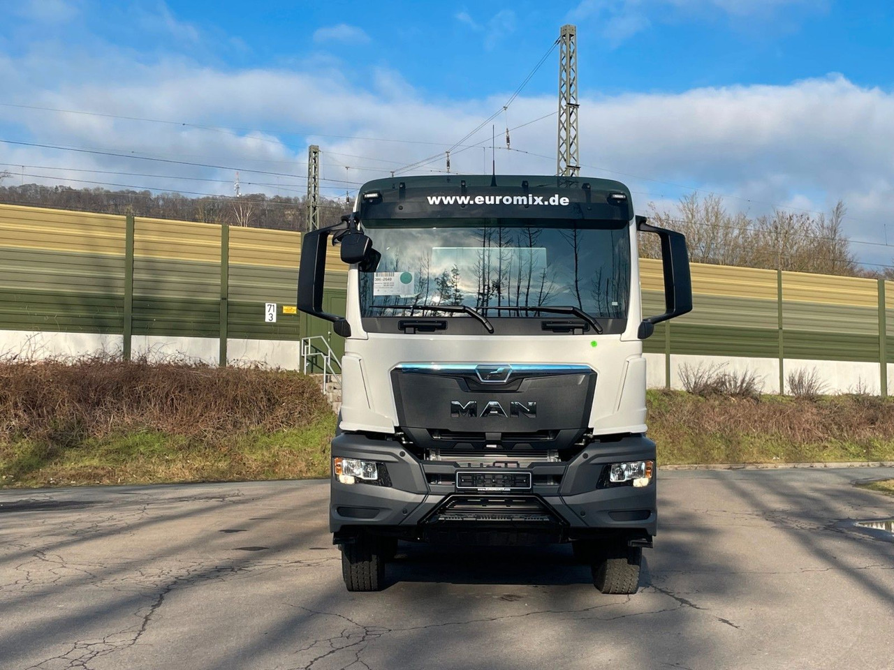 MAN TGS 41.400 8x4 / EuromixMTP EM 12m³ R / EURO 2 - Camião betoneira: foto 2 MAN TGS 41.400 8x4 / EuromixMTP EM 12m³ R / EURO 2 - Camião betoneira: foto 2