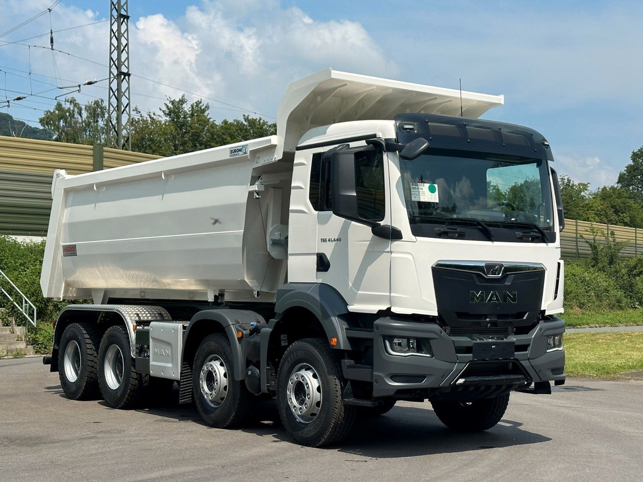 MAN TGS 41.440 8x4 EuromixMTP Mulden-Kipper - Camião basculante: foto 1 MAN TGS 41.440 8x4 EuromixMTP Mulden-Kipper - Camião basculante: foto 1