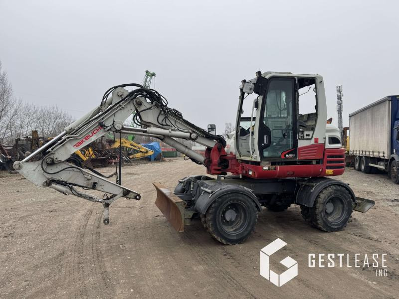 Takeuchi TB295W - Escavadeira de rodas: foto 1 Takeuchi TB295W - Escavadeira de rodas: foto 1