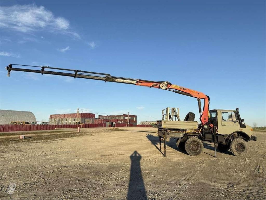 Mercedes-Benz Unimog Palfinger PK 12000 18 m 6.8 t Radio - Camião grua: foto 1 Mercedes-Benz Unimog Palfinger PK 12000 18 m 6.8 t Radio - Camião grua: foto 1