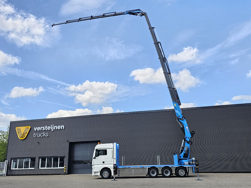 MAN TGX 35.480 8x4-4 / HMF 85 t/m + JIB / WINCH - Camião de caixa aberta/ Plataforma, Camião grua: foto 2 MAN TGX 35.480 8x4-4 / HMF 85 t/m + JIB / WINCH - Camião de caixa aberta/ Plataforma, Camião grua: foto 2