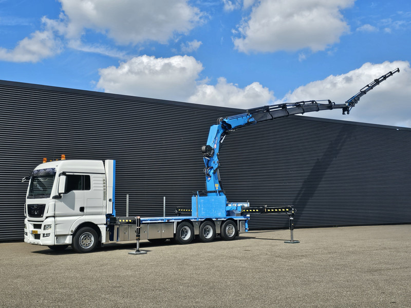 MAN TGX 35.480 8x4-4 / HMF 85 t/m + JIB / WINCH - Camião de caixa aberta/ Plataforma, Camião grua: foto 1 MAN TGX 35.480 8x4-4 / HMF 85 t/m + JIB / WINCH - Camião de caixa aberta/ Plataforma, Camião grua: foto 1