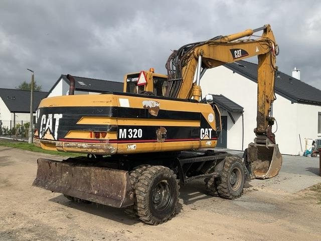 CAT M320 - Escavadeira de rodas: foto 4 CAT M320 - Escavadeira de rodas: foto 4
