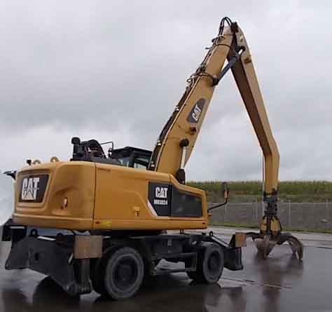 Caterpillar MH3024 – Material handler / Umschlagbagger - Escavadeira: foto 1 Caterpillar MH3024 – Material handler / Umschlagbagger - Escavadeira: foto 1