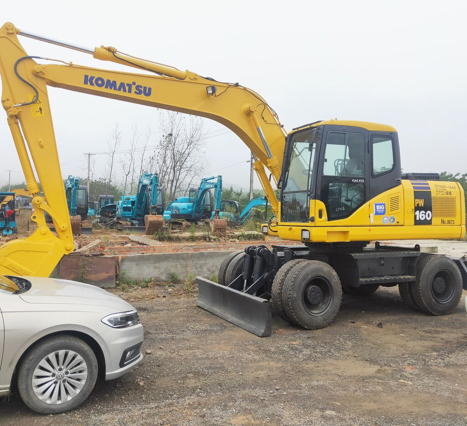 Komatsu PW160 - Escavadeira de rodas: foto 1 Komatsu PW160 - Escavadeira de rodas: foto 1