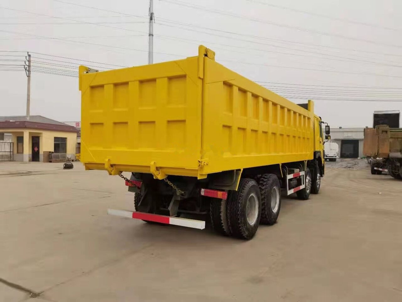 Sinotruk HOWO 8*4 Dump truck - Camião basculante: foto 5 Sinotruk HOWO 8*4 Dump truck - Camião basculante: foto 5