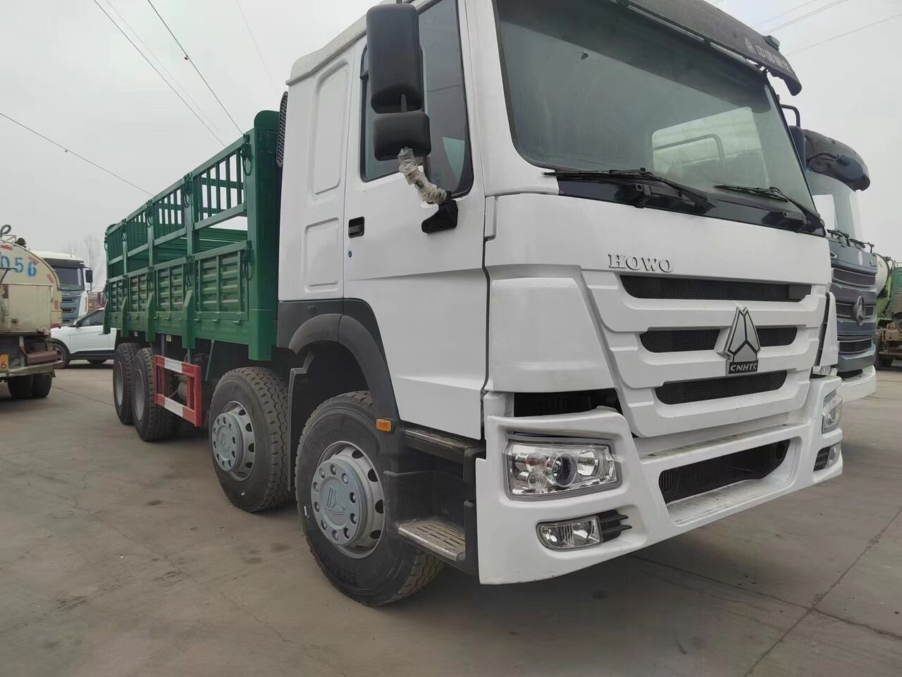 Sinotruk HOWO 8*4 Fence Truck - Camião de caixa aberta/ Plataforma: foto 2 Sinotruk HOWO 8*4 Fence Truck - Camião de caixa aberta/ Plataforma: foto 2
