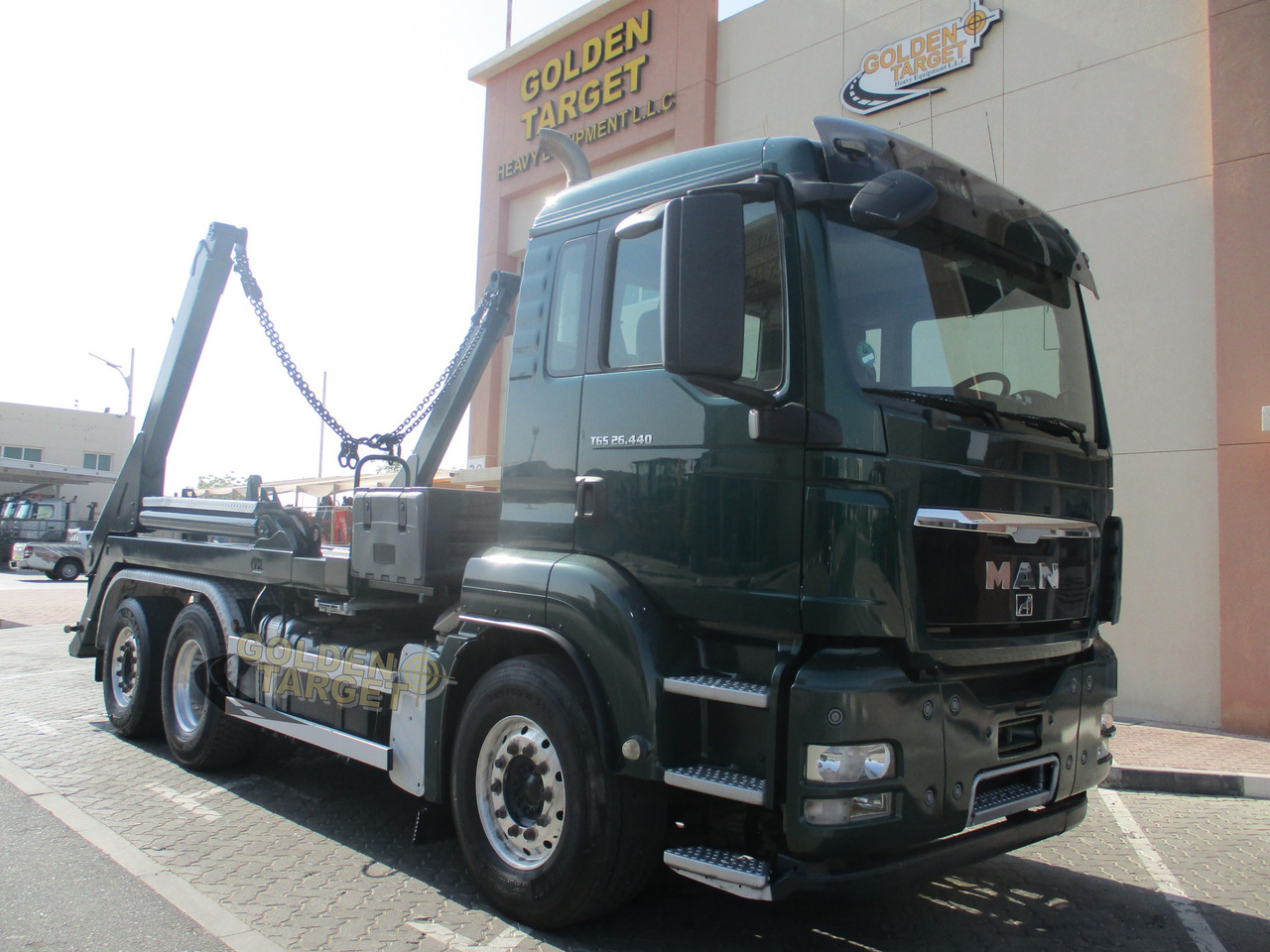 MAN TGS 26.440 6x2 Skip Loader - Camião multibenne: foto 1 MAN TGS 26.440 6x2 Skip Loader - Camião multibenne: foto 1