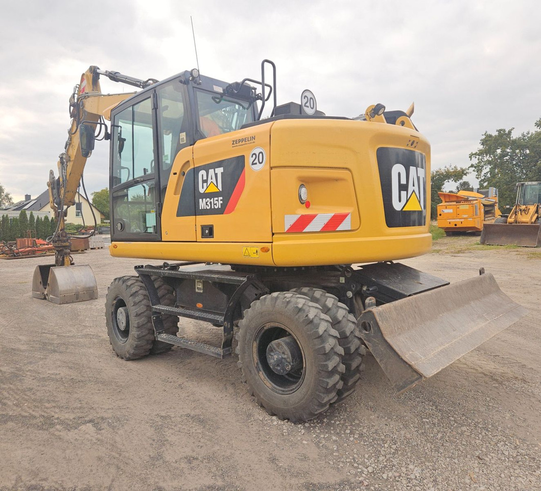 CAT M315F, orig. 2.828h - Escavadeira de rodas: foto 2 CAT M315F, orig. 2.828h - Escavadeira de rodas: foto 2