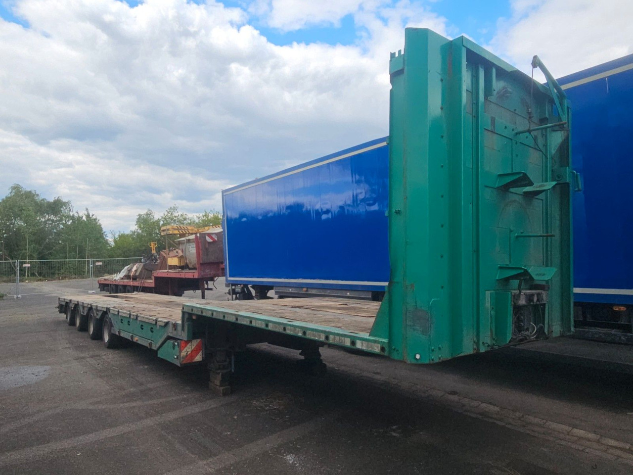 Meusburger MPG-4 Tieflader mit Radmulden 39.5t - Semi-reboque baixa: foto 1 Meusburger MPG-4 Tieflader mit Radmulden 39.5t - Semi-reboque baixa: foto 1