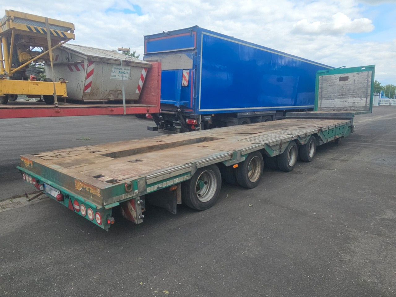 Meusburger MPG-4 Tieflader mit Radmulden 39.5t - Semi-reboque baixa: foto 1 Meusburger MPG-4 Tieflader mit Radmulden 39.5t - Semi-reboque baixa: foto 1