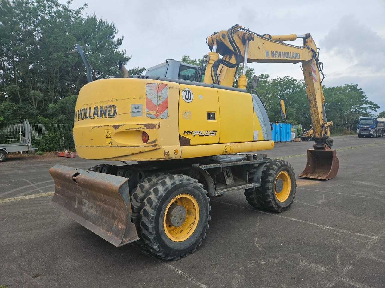 New Holland MH Plus 18t Mobilbagger - Escavadeira de rodas: foto 3 New Holland MH Plus 18t Mobilbagger - Escavadeira de rodas: foto 3