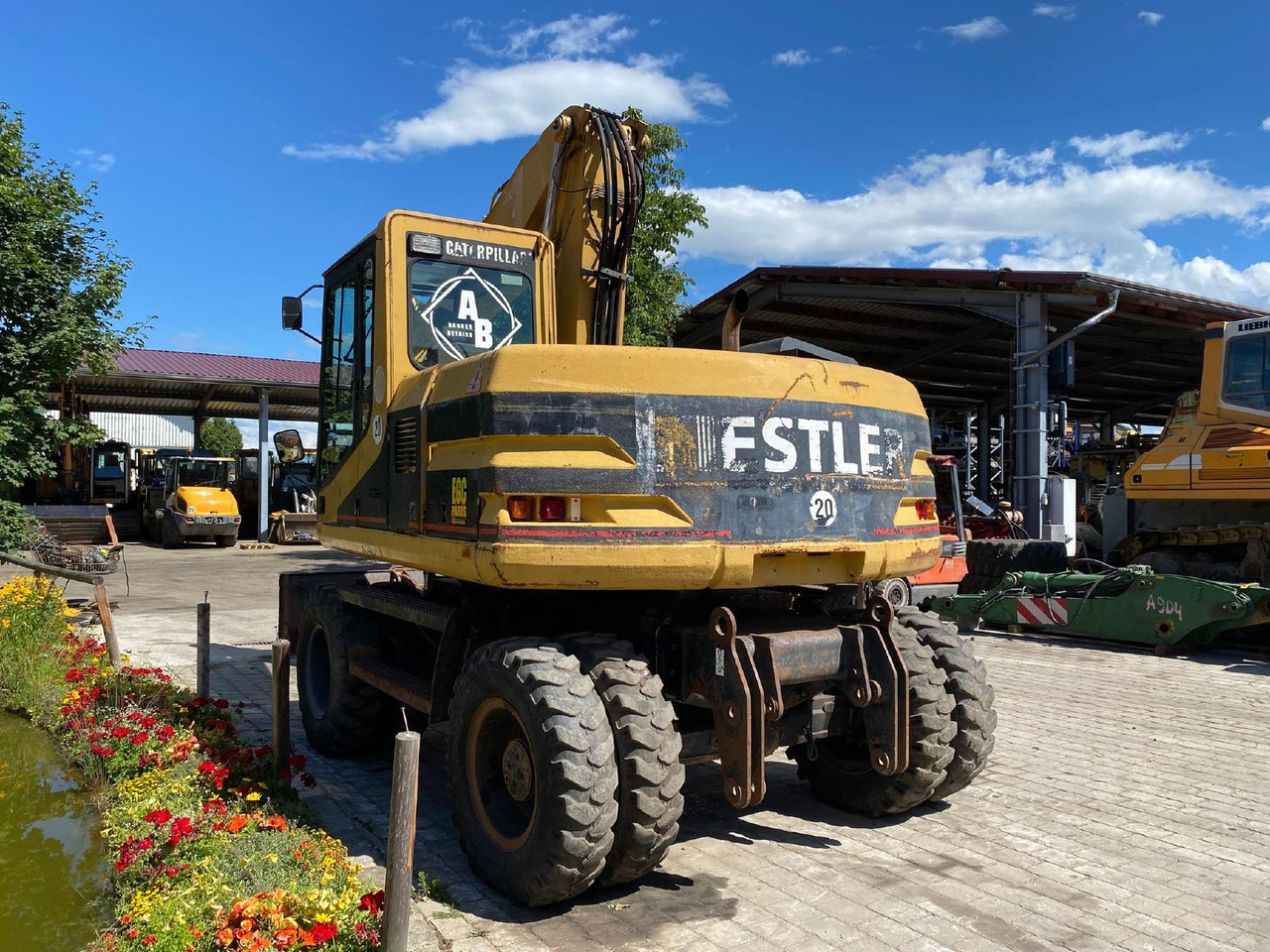 Caterpillar M 312 - Escavadeira de rodas: foto 5 Caterpillar M 312 - Escavadeira de rodas: foto 5