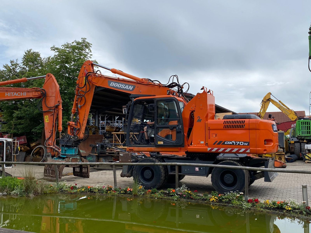 Doosan DX 170 W - Escavadeira de rodas: foto 3 Doosan DX 170 W - Escavadeira de rodas: foto 3