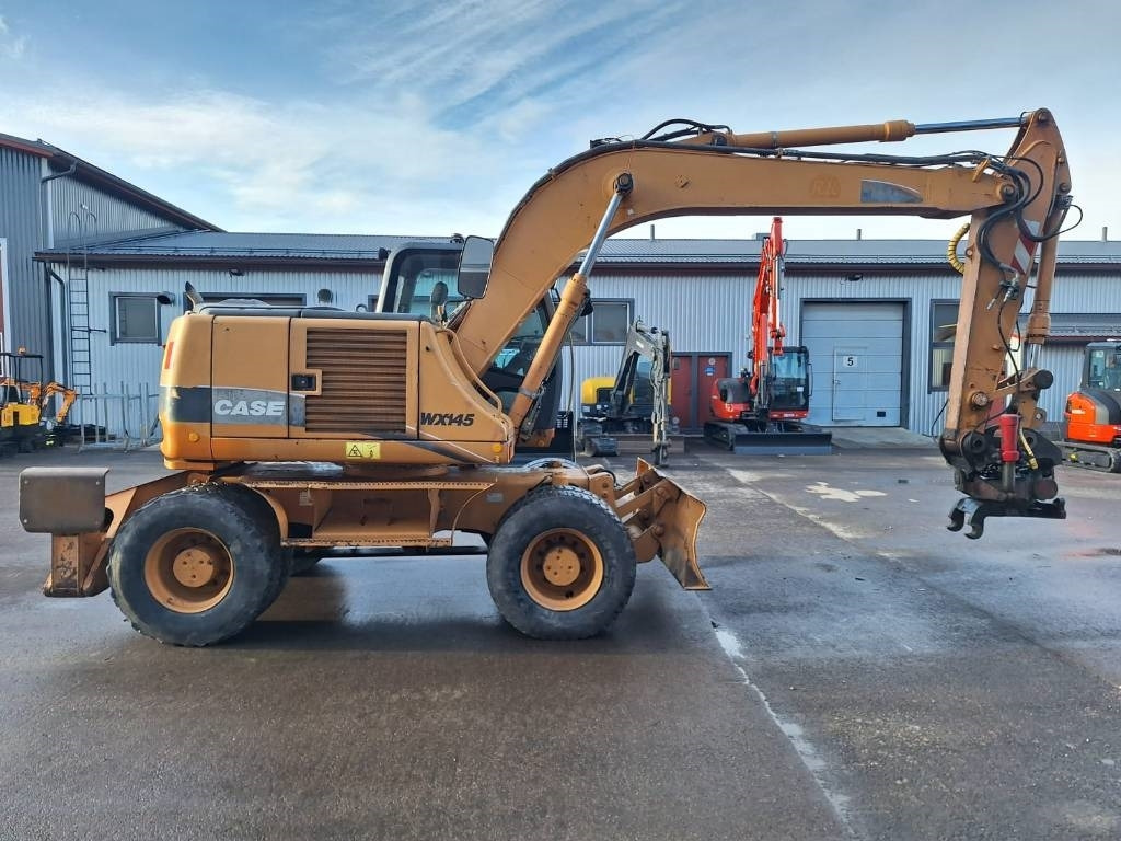 Case WX145 PYÖRITTÄJÄLLÄ  - Escavadeira de rodas: foto 5 Case WX145 PYÖRITTÄJÄLLÄ  - Escavadeira de rodas: foto 5