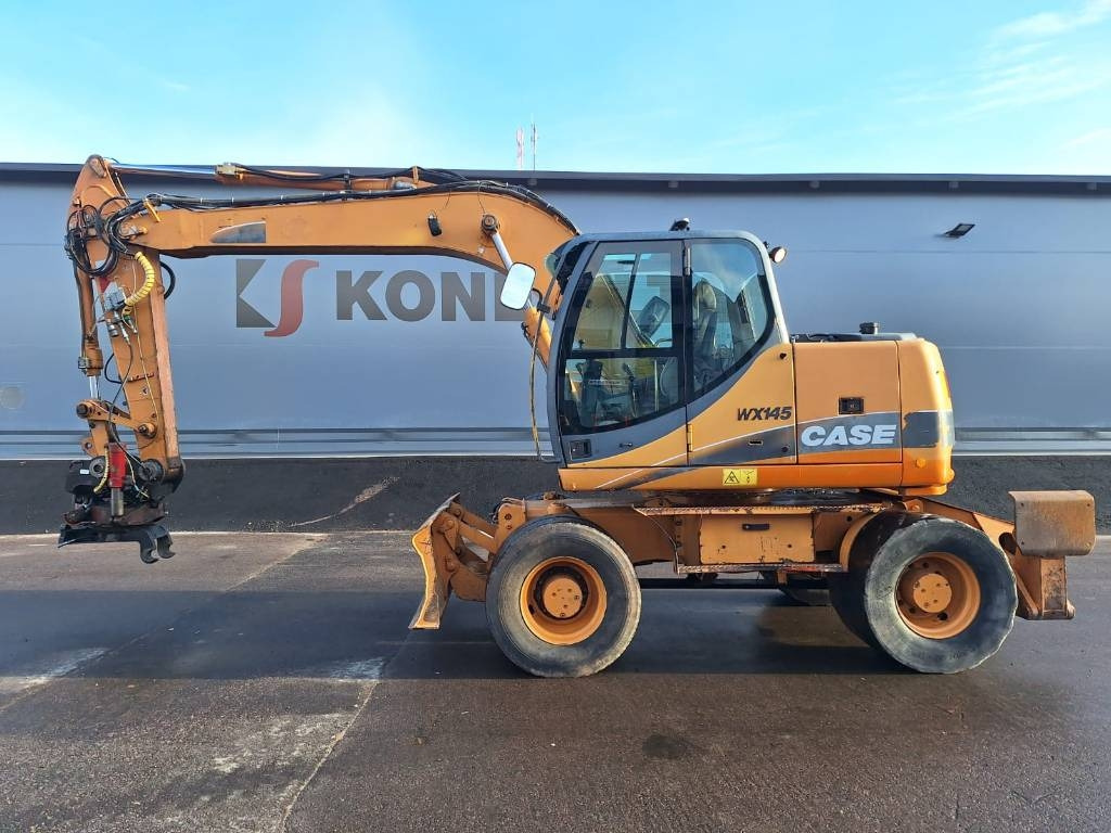 Case WX145 PYÖRITTÄJÄLLÄ  - Escavadeira de rodas: foto 1 Case WX145 PYÖRITTÄJÄLLÄ  - Escavadeira de rodas: foto 1