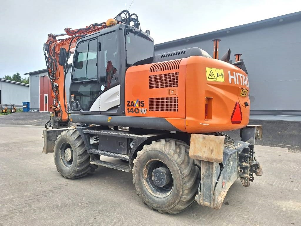Hitachi ZX140W-5 HUIPPUVARUSTEET - Escavadeira de rodas: foto 2 Hitachi ZX140W-5 HUIPPUVARUSTEET - Escavadeira de rodas: foto 2