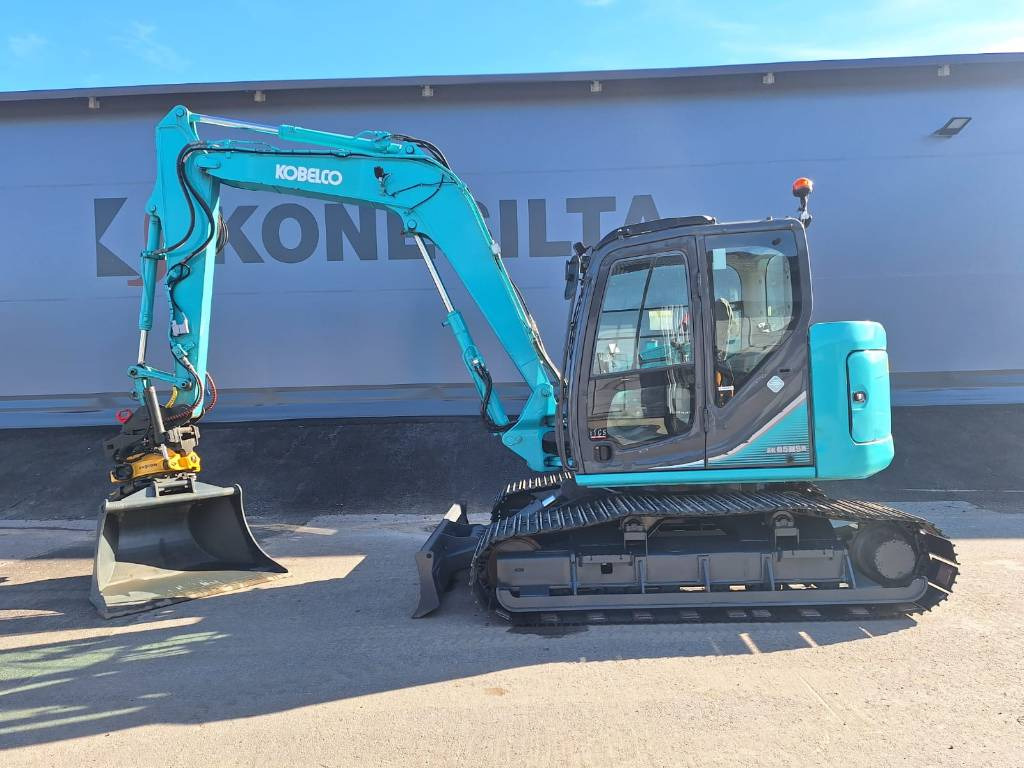 Mini escavadeira Kobelco SK85MSR-3 PYÖRITTÄJÄLLÄ: foto 1