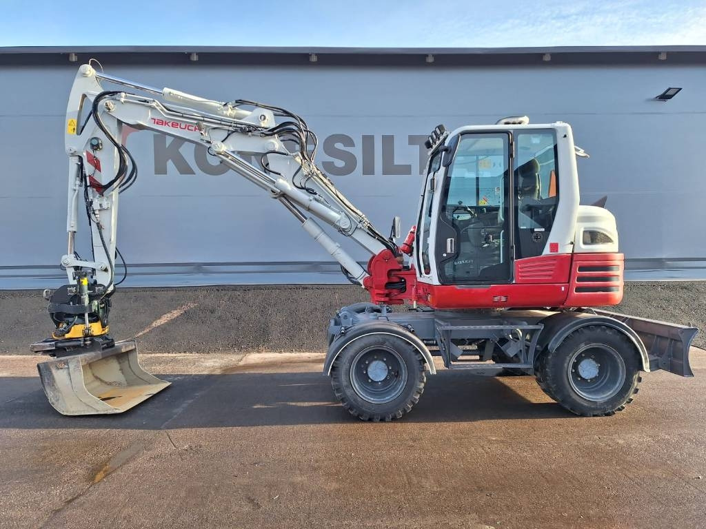Takeuchi TB295W PYÖRITTÄJÄLLÄ  - Escavadeira de rodas: foto 1 Takeuchi TB295W PYÖRITTÄJÄLLÄ  - Escavadeira de rodas: foto 1