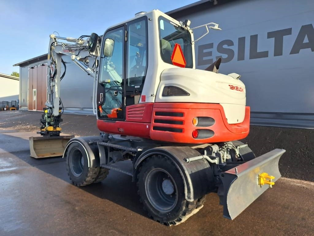 Takeuchi TB295W PYÖRITTÄJÄLLÄ  - Escavadeira de rodas: foto 2 Takeuchi TB295W PYÖRITTÄJÄLLÄ  - Escavadeira de rodas: foto 2