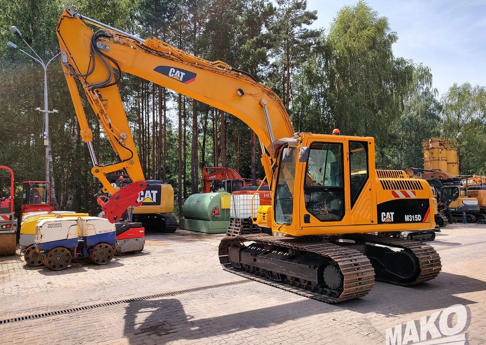Caterpillar 315D - Escavadora de rastos: foto 1 Caterpillar 315D - Escavadora de rastos: foto 1