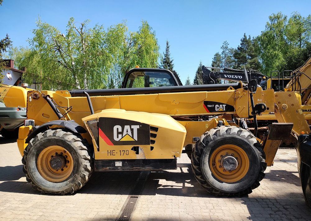 Caterpillar TH417 - Empilhador telescópico: foto 4 Caterpillar TH417 - Empilhador telescópico: foto 4