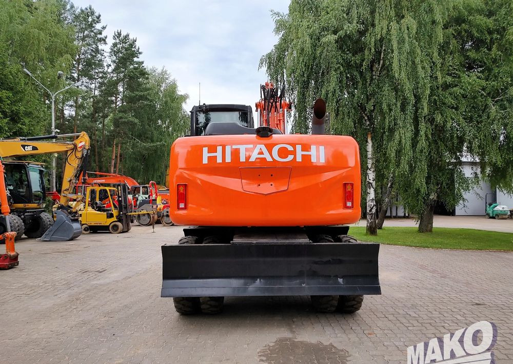 Hitachi ZX 140 - Escavadeira de rodas: foto 3 Hitachi ZX 140 - Escavadeira de rodas: foto 3