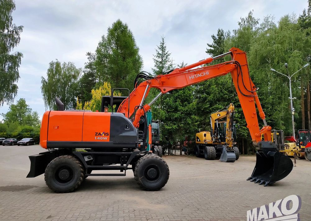 Hitachi ZX 140 - Escavadeira de rodas: foto 5 Hitachi ZX 140 - Escavadeira de rodas: foto 5