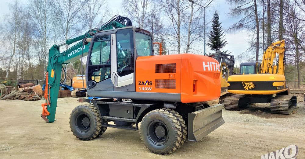 Hitachi ZX140W-3 - Escavadeira de rodas: foto 2 Hitachi ZX140W-3 - Escavadeira de rodas: foto 2