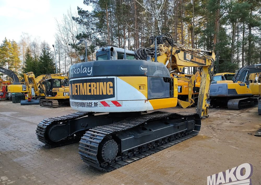 Komatsu PC228USLC-3 - Escavadora de rastos: foto 4 Komatsu PC228USLC-3 - Escavadora de rastos: foto 4