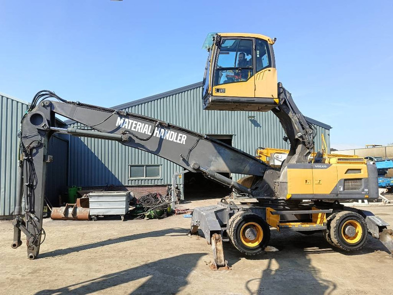 Volvo EW 210 D waste industry handler 25ton umslagbagger - Manipulador de material: foto 1 Volvo EW 210 D waste industry handler 25ton umslagbagger - Manipulador de material: foto 1