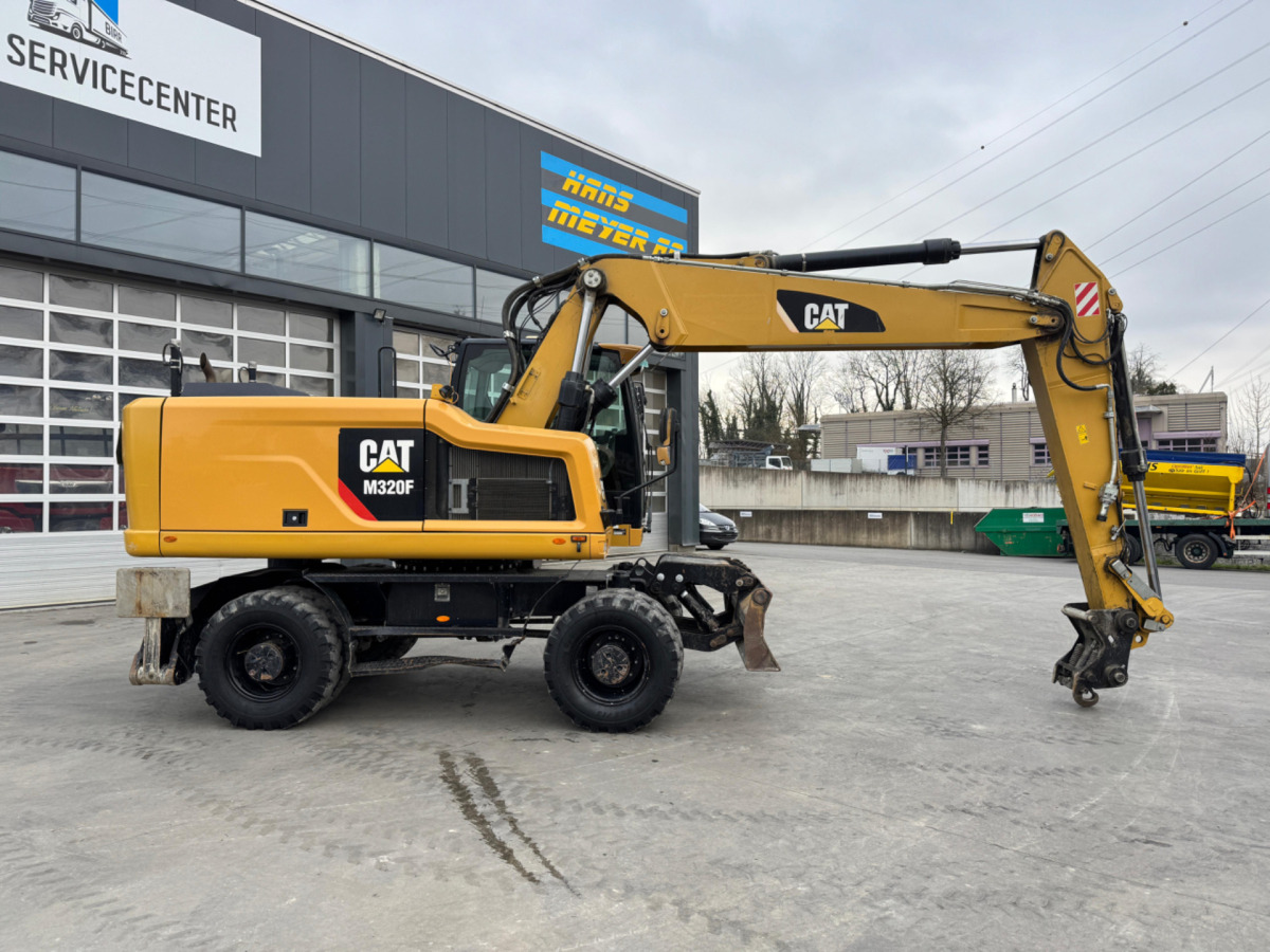 CATERPILLAR M320F Oilquick - Escavadeira de rodas: foto 3 CATERPILLAR M320F Oilquick - Escavadeira de rodas: foto 3
