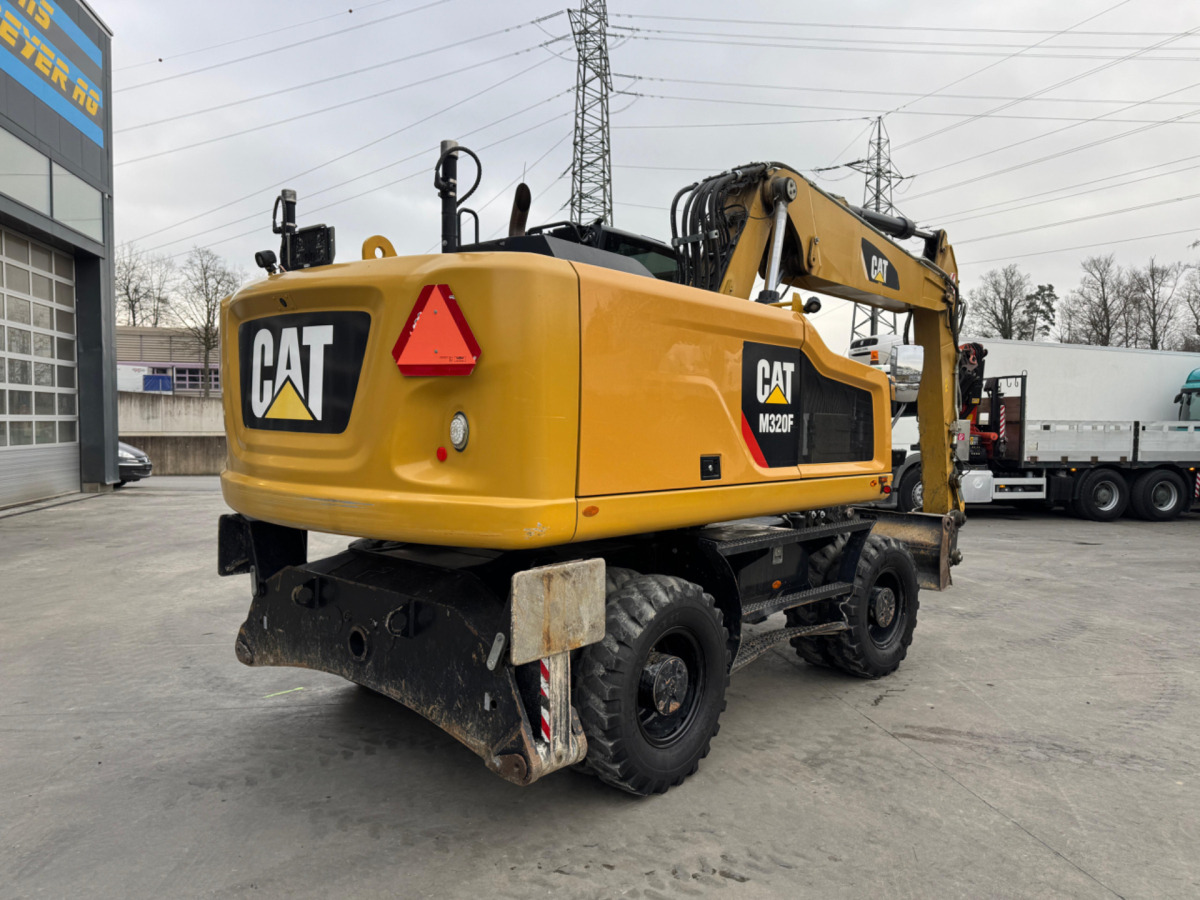 CATERPILLAR M320F Oilquick - Escavadeira de rodas: foto 4 CATERPILLAR M320F Oilquick - Escavadeira de rodas: foto 4