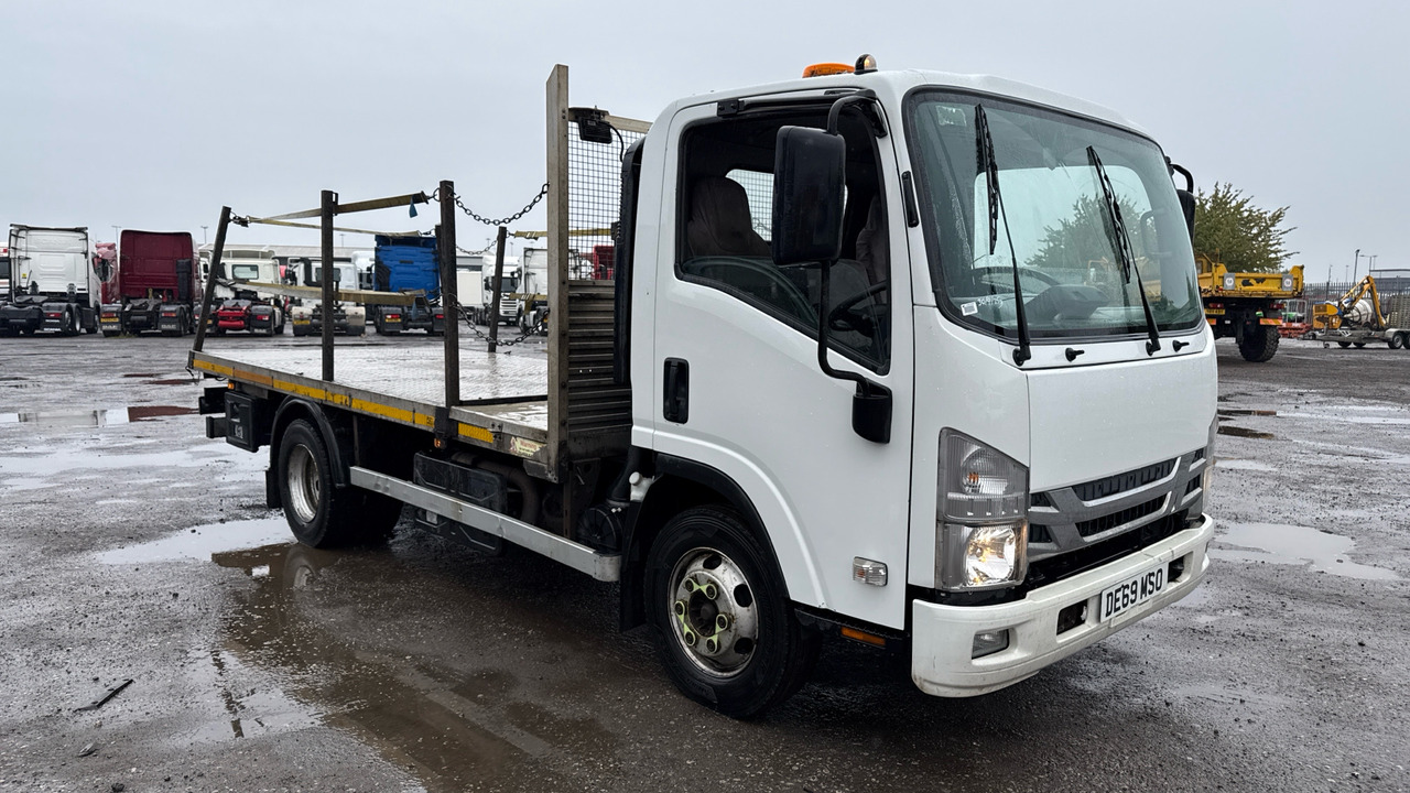 Isuzu N75 190 - Carrinha de caixa aberta: foto 1 Isuzu N75 190 - Carrinha de caixa aberta: foto 1